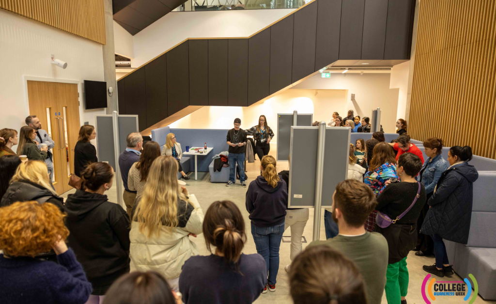 EPIC Youth Council member, Kai, delivering a speech in front of a crowd of people at the TUD Dublin launch of Embrace Our Stories.